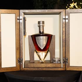 The handmade crystal decanter is designed around the shape of a dirk. The oak cabinet it is housed in is handcrafted in south-west Scotland by Fairlie Furniture. Picture: Christy Linder