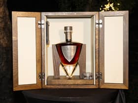 The handmade crystal decanter is designed around the shape of a dirk. The oak cabinet it is housed in is handcrafted in south-west Scotland by Fairlie Furniture. Picture: Christy Linder