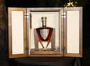 The handmade crystal decanter is designed around the shape of a dirk. The oak cabinet it is housed in is handcrafted in south-west Scotland by Fairlie Furniture. Picture: Christy Linder
