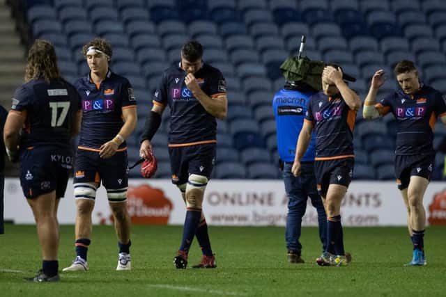 Dejected Edinburgh players at full-time after the late loss to Ulster at BT Murrayfield. Picture: Craig Williamson/SRU/SNS