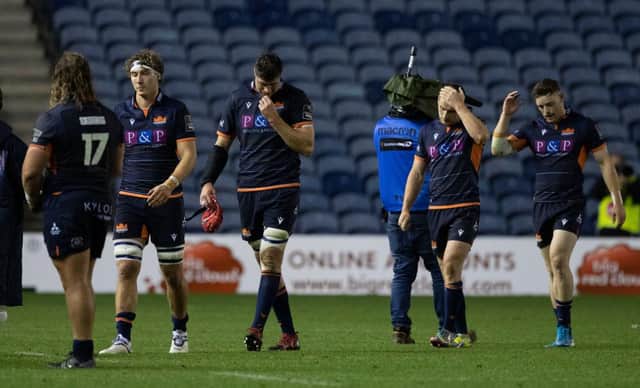Dejected Edinburgh players at full-time after the late loss to Ulster at BT Murrayfield. Picture: Craig Williamson/SRU/SNS
