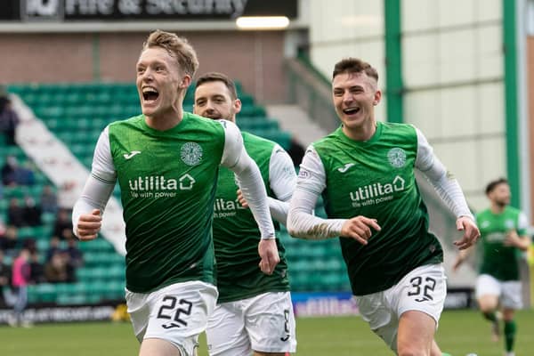 Jake Doyle-Hayes' team-mates rush to congratulate him after his second goal against Ross County.