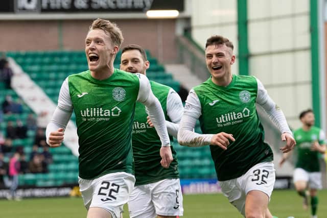 Jake Doyle-Hayes' team-mates rush to congratulate him after his second goal against Ross County.