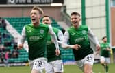 Jake Doyle-Hayes' team-mates rush to congratulate him after his second goal against Ross County.