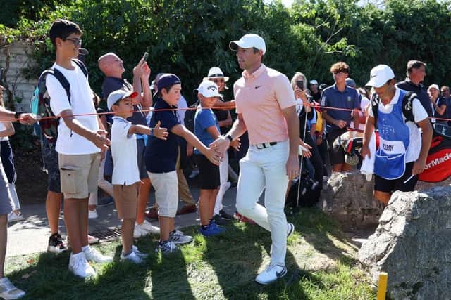 Rory McIlroy greets fans during the final round of the DS Automobiles Italian Open. Picture: Andrew Redington/Getty Images.