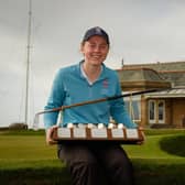 Ellie Monk poses for a photo with the Helen Holm Scottish Women's Open trophy after her two-shot success at Royal Troon Golf Club. Picture: Scottish Golf