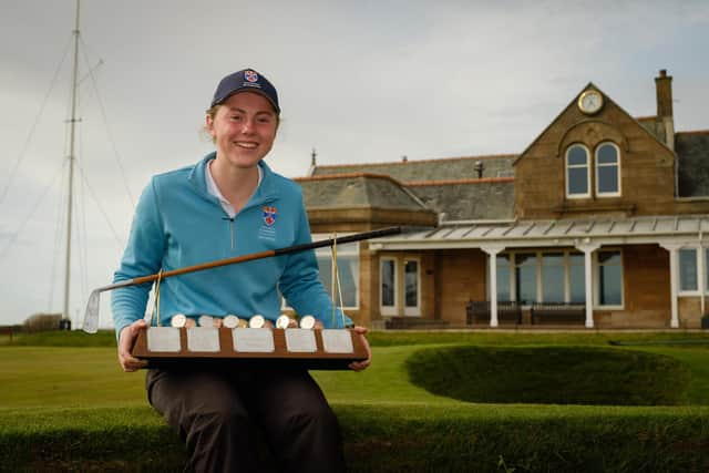 Ellie Monk poses for a photo with the Helen Holm Scottish Women's Open trophy after her two-shot success at Royal Troon Golf Club. Picture: Scottish Golf