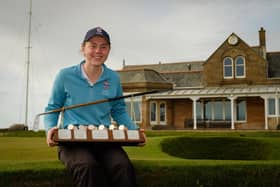 Ellie Monk poses for a photo with the Helen Holm Scottish Women's Open trophy after her two-shot success at Royal Troon Golf Club. Picture: Scottish Golf