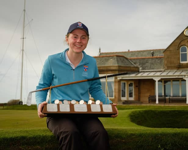 Ellie Monk poses for a photo with the Helen Holm Scottish Women's Open trophy after her two-shot success at Royal Troon Golf Club. Picture: Scottish Golf