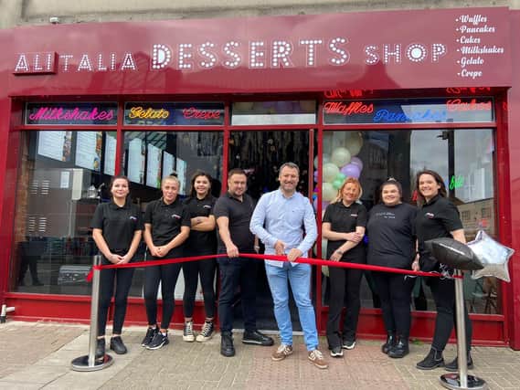 Mr Clarke-Smith attended the opening day at Alitalia Dessert Shop. Pictured with owner Ali Talay (middle left) and staff.
