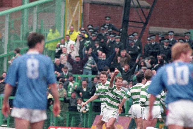 Dariusz Wdowczyk (2nd left) celebrates after putting Celtic two goals ahead against Rangers