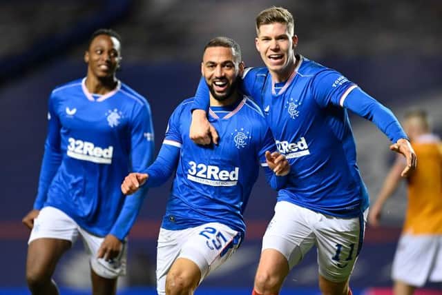 Kemar Roofe celebrates his second goal in Rangers' 3-1 win over Motherwell at Ibrox with fellow striker Cedric Itten who was also on target. (Photo by Rob Casey / SNS Group)