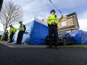 Police officers outside the home of former SNP chief executive Peter Murrell, and his wife Nicola Sturgeon, in Uddingston, after he was 'released without charge pending further investigation' (Picture: Robert Perry/PA)