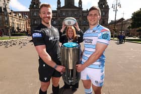Kyle Steyn, Lord Provost of the City of Glasgow Jacqueline McLaren, and Rory Darge alongside the United Rugby Championship trophy during a Glasgow Warriors civic reception at the Glasgow City Chambers, on September 04, 2024. (Photo by Ross MacDonald / SNS Group)