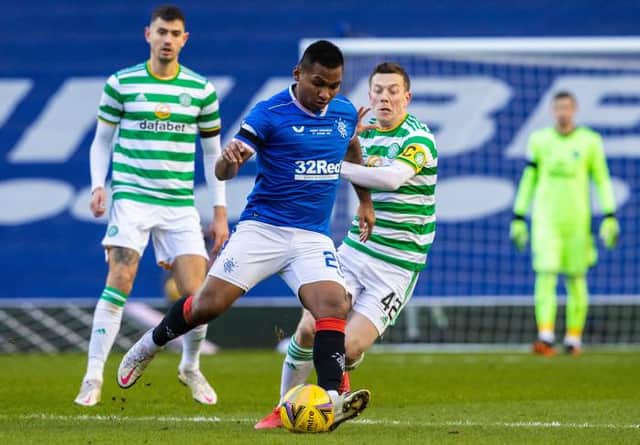 Alfredo Morelos, pictured in action against Celtic's Callum McGregor at Ibrox, is sure to be the subject of fresh speculation during the January transfer window. (Photo by Alan Harvey / SNS Group)