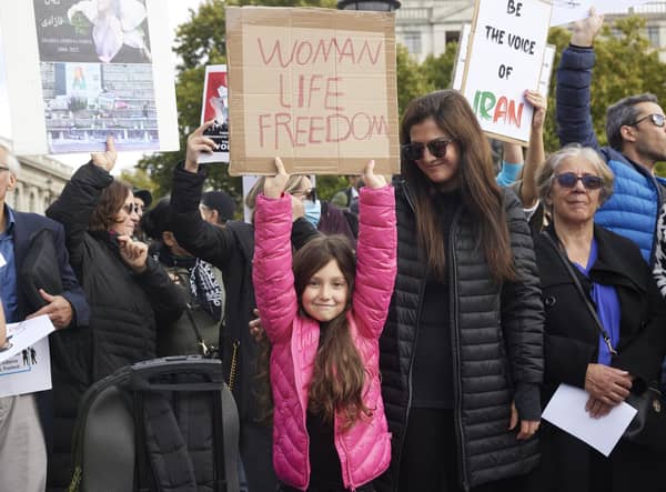 People gather in solidarity with those protesting in Iran, following the death of Mahsa Amini, 22, after she was arrested for not wearing her hijab correctly (Picture: Alex McBride/Getty Images)
