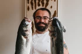 Dan Ashmore of Askr with his fishy friends. Copyright - Grant Anderson / www.grantanderson.me / @grantandersondotme