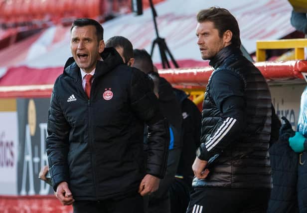 Aberdeen manager Stephen Glass was one of ten booked by the referee in the final 22 minutes. Picture: SNS