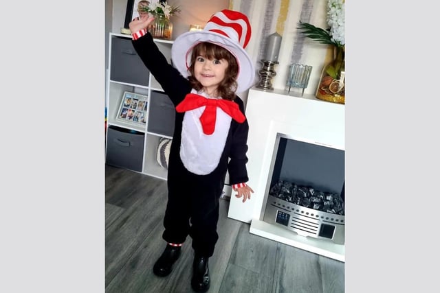 Two-year-old Hallie took inspiration from the iconic Dr Seuss book Cat in the Hat.