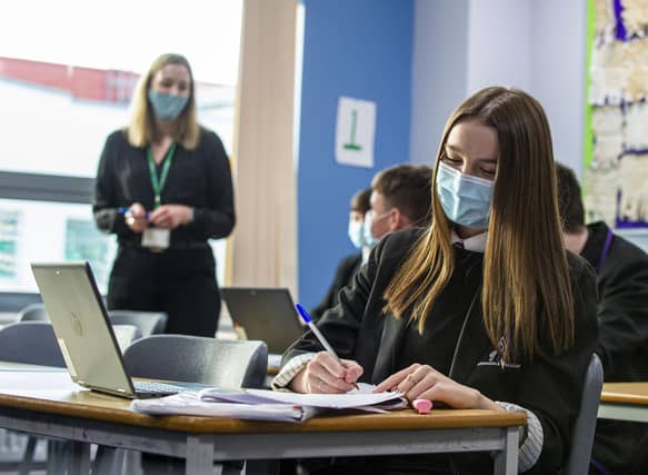 Scottish Labour has branded the Scottish Government’s school ventilation strategy “farcical and dangerous” as it calls for an update on the strategy (Photo: Lisa Ferguson).
Higher History S5/S6 Armadale Academy students/pupils wear masks in the classroom along with their teacher
West Lothian has been placed into Tier 3 alon with the rest of the Central Belt
COVID 19, CORONA VIRUS - From today teachers and S4-S6 pupils must wear face masks/face coverings in classrooms in the new tier 3 and tier 4 COVID 19 restrictions.
Senior pupils and their teachers are being advised to wear face coverings in classrooms for schools in the new level 3 and 4 restriction areas.
The Scottish government has released new guidance on school safety to take account of the five-level Covid alert system, which begins on Monday.
Other guidance advises staff to wear face coverings in all schools, where social distancing is not possible.
And parents should wear masks even at drop-off and pick-up.