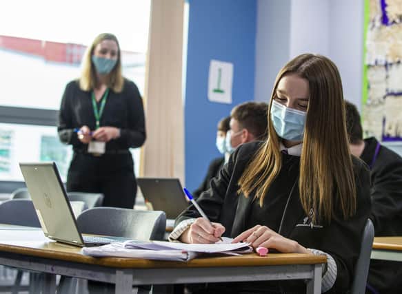 Scottish Labour has branded the Scottish Government’s school ventilation strategy “farcical and dangerous” as it calls for an update on the strategy (Photo: Lisa Ferguson).
Higher History S5/S6 Armadale Academy students/pupils wear masks in the classroom along with their teacher
West Lothian has been placed into Tier 3 alon with the rest of the Central Belt
COVID 19, CORONA VIRUS - From today teachers and S4-S6 pupils must wear face masks/face coverings in classrooms in the new tier 3 and tier 4 COVID 19 restrictions.
Senior pupils and their teachers are being advised to wear face coverings in classrooms for schools in the new level 3 and 4 restriction areas.
The Scottish government has released new guidance on school safety to take account of the five-level Covid alert system, which begins on Monday.
Other guidance advises staff to wear face coverings in all schools, where social distancing is not possible.
And parents should wear masks even at drop-off and pick-up.