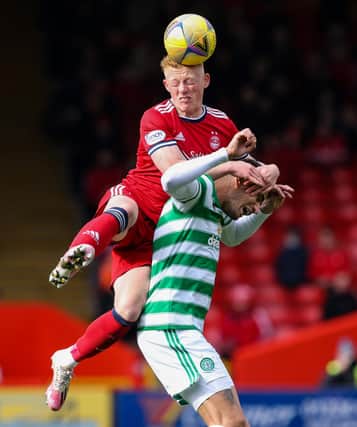Aberdeen's Matty Longstaff challenges Celtic's Nir Bitton during the teams' Pittodrie meeting in October. (Photo by Craig Williamson / SNS Group)