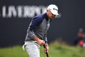 Brian Harman reacts after holing a par putt on the 18th green in the third round of the 151st Open at Royal Liverpool. Picture: Jared C. Tilton/Getty Images.