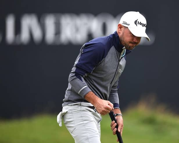 Brian Harman reacts after holing a par putt on the 18th green in the third round of the 151st Open at Royal Liverpool. Picture: Jared C. Tilton/Getty Images.