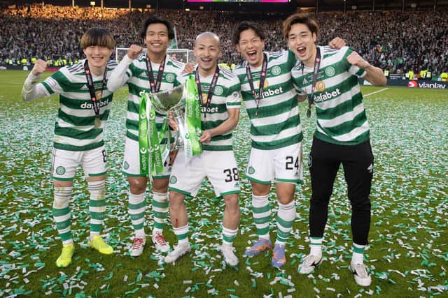 Celtic's Japenese contingent, Kyogo Furuhashi, Reo Hatate, Daizen Maeda, Tomoki Iwata and Yuki Kobayashi, celebrate after the Viaplay Cup final win over Rangers. (Photo by Alan Harvey / SNS Group)