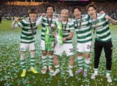 Celtic's Japenese contingent, Kyogo Furuhashi, Reo Hatate, Daizen Maeda, Tomoki Iwata and Yuki Kobayashi, celebrate after the Viaplay Cup final win over Rangers.  (Photo by Alan Harvey / SNS Group)