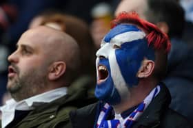 Scotland fans sing the national anthem before the Guinness Six Nations match at BT Murrayfield, Edinburgh.