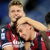Aaron Hickey celebrates after scoring the opening goal  during the Serie A match between Bologna FC v Genoa CFC at Stadio Renato Dall'Ara on September 21. (Photo by Mario Carlini / Iguana Press/Getty Images)