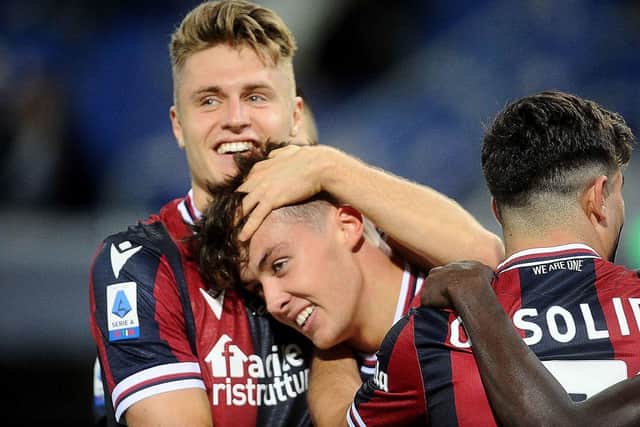 Aaron Hickey celebrates after scoring the opening goal during the Serie A match between Bologna FC v Genoa CFC at Stadio Renato Dall'Ara on September 21. (Photo by Mario Carlini / Iguana Press/Getty Images)
