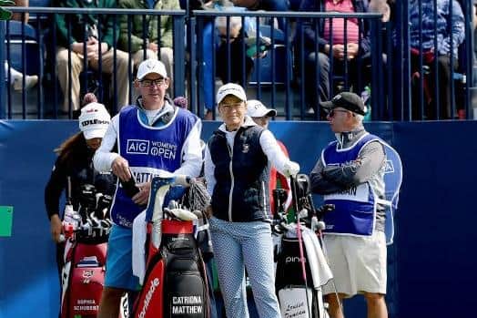 Catriona Matthew chats with her husband/caddie Graeme on the first tee before heading out in the second round at Muirfield. Picture: Octavio Passos/Getty Images.