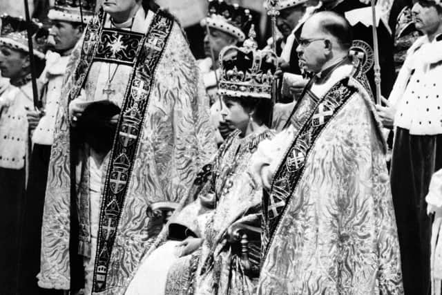 Queen Elizabeth II receives pledges of allegiance from her subjects during her coronation ceremony on June 2, 1953
