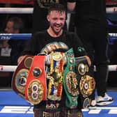 Josh Taylor poses with his title belts after his win by unanimous decision over Jose Ramirez. The five belts are from the WBO, WBA, IBF and WBC and The Ring magazine.  Picture: David Becker/Getty Images