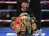 Josh Taylor poses with his title belts after his win by unanimous decision over Jose Ramirez. The five belts are from the WBO, WBA, IBF and WBC and The Ring magazine.  Picture: David Becker/Getty Images