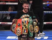 Josh Taylor poses with his title belts after his win by unanimous decision over Jose Ramirez. The five belts are from the WBO, WBA, IBF and WBC and The Ring magazine.  Picture: David Becker/Getty Images