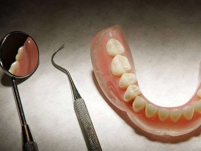 In 2021 Nicola Sturgeon vowed to abolish all NHS dentistry charges if the SNP was re-elected; this month the Scottish Government halved the number of check-ups to which patients are entitled, while hiking treatment costs (Picture: Peter Macdiarmid/Getty Images)