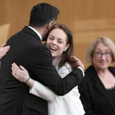 Humza Yousaf hugs Kate Forbes in the main chamber during the vote for the new First Minister at the Scottish Parliament in Edinburgh.