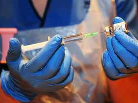 A nurse prepares a dose of Covid-19 vaccine (Picture: Michael Gillen)
