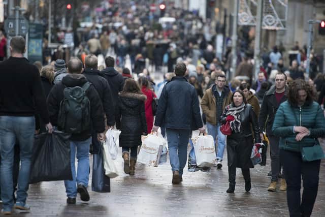 People carrying shopping bags on Buchanan Street in Glasgow's city centre. Picture: John Linton/PA Wire