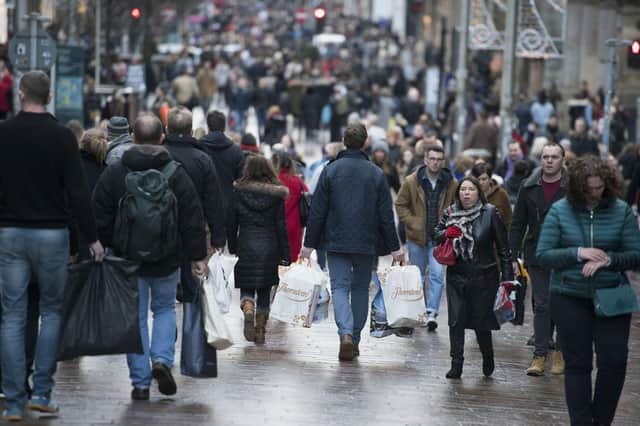 People carrying shopping bags on Buchanan Street in Glasgow's city centre. Picture: John Linton/PA Wire