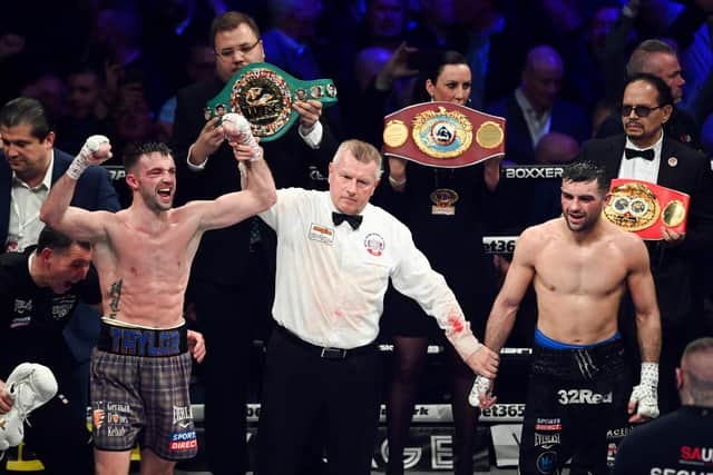 Josh Taylor is declared the victor over Jack Catterall after the world super-lightweight title fight at the OVO Hydro on Saturday. (Photo by Paul Devlin / SNS Group)