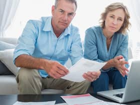 Middle-income households will face a hit to their personal disposable income ranging from 7 per cent to 13 per cent, according to the report. Picture: Getty Images/iStockphoto.