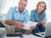 Middle-income households will face a hit to their personal disposable income ranging from 7 per cent to 13 per cent, according to the report. Picture: Getty Images/iStockphoto.