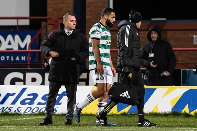 Celtic's Cameron Carter-Vickers goes off injured during the 3-0 win at Dundee. (Photo by Ross Parker / SNS Group)