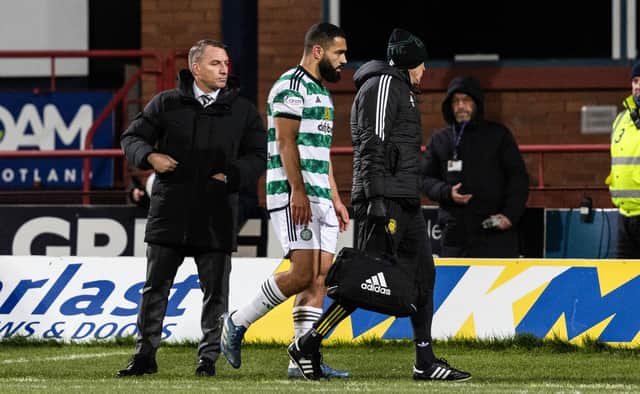 Celtic's Cameron Carter-Vickers goes off injured during the 3-0 win at Dundee. (Photo by Ross Parker / SNS Group)