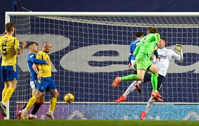 Zander Clark's downward header is turned in by St Johnstone striker Chris Kane to make it 1-1 in stoppage time during the dramatic Scottish Cup tie at Ibrox. (Photo by Rob Casey / SNS Group)