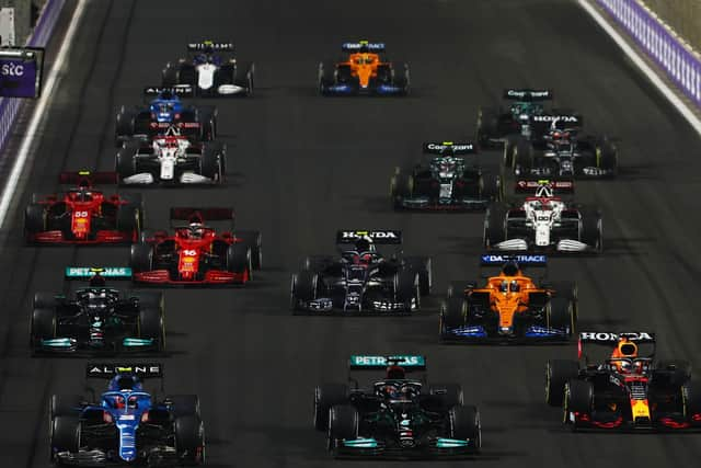 Esteban Ocon, Lewis Hamilton, and Max Verstappen battling for track position at last year's Grand Prix of Saudi Arabia. Photo: Mark Thompson/Getty Images.